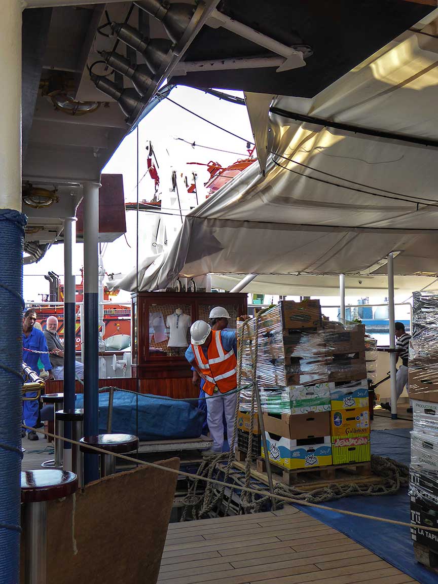 All hands on deck! Head bartender Alberto becomes the loading foreman as Star Flyer takes on supplies for the crossing.