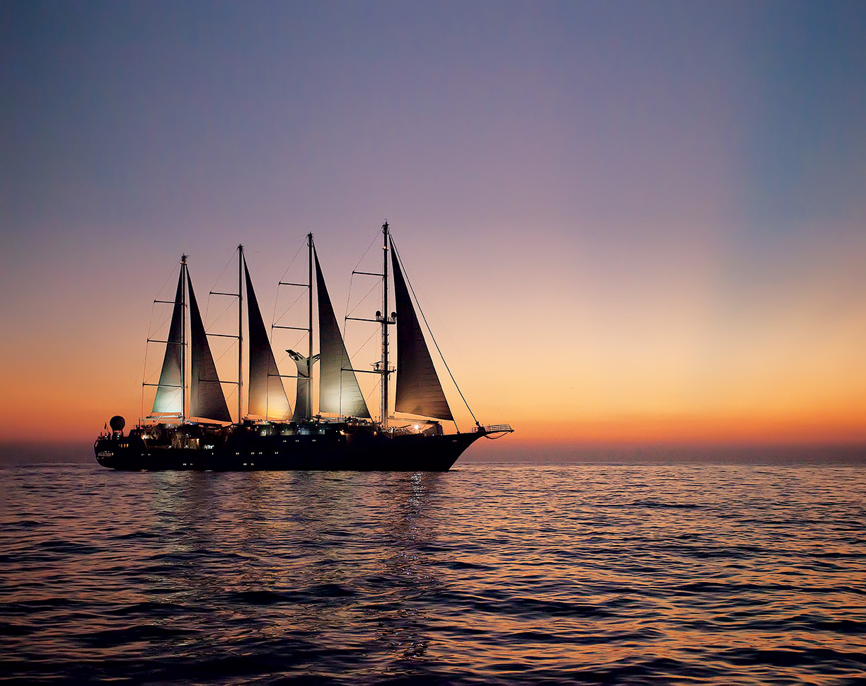 Windstar's Wind Surf yacht at sunset. Wind Surf Caribbean Cruise review