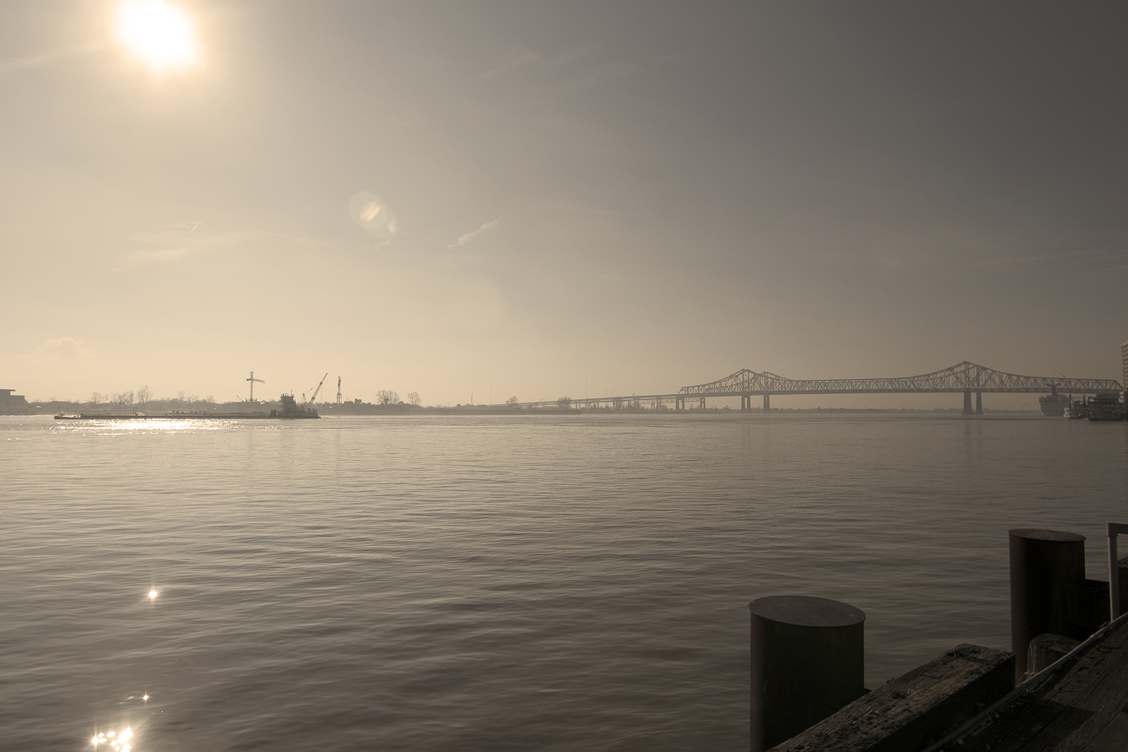 The Mississippi River at New Orleans, looking toward the GNO bridge. Photograph by Ann Fisher