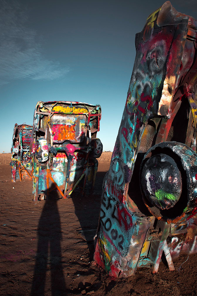 Cadillac Ranch at sunrise, with photographer's shadow
