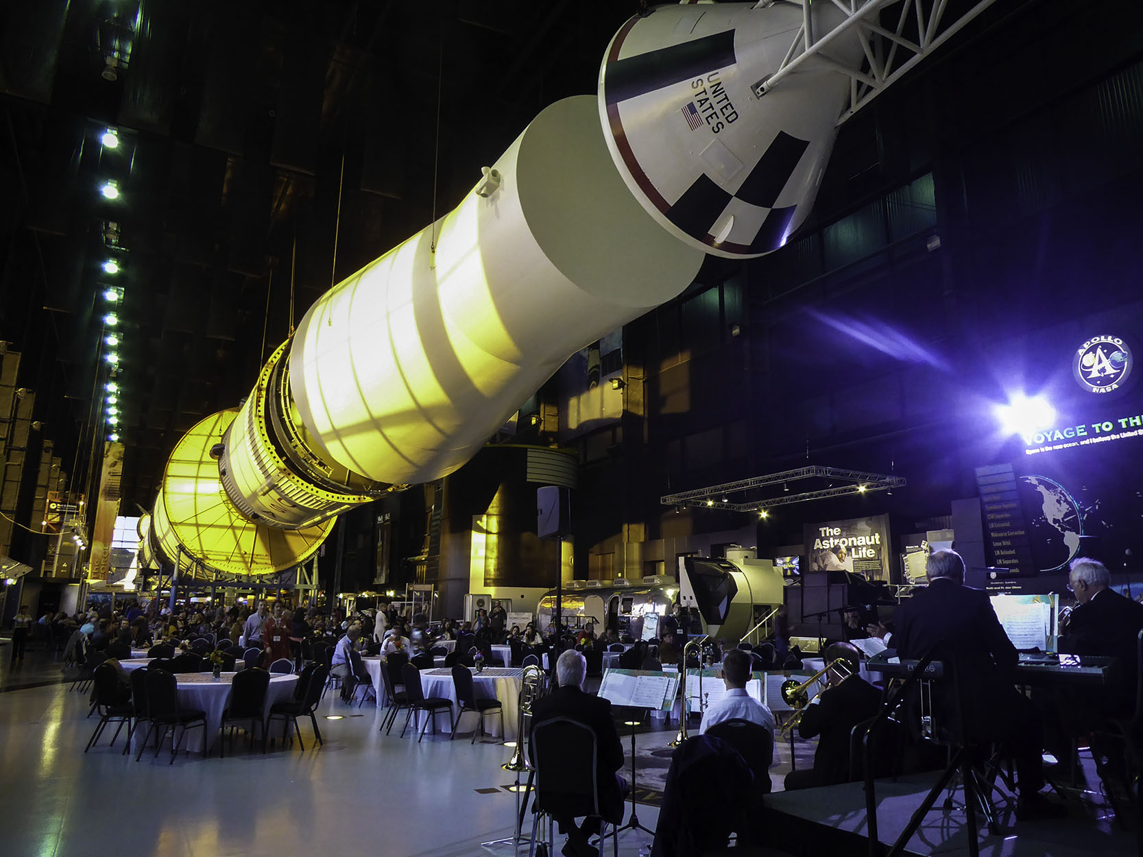 Huntsville, Alabama, really went all out for the travel bloggers at the TBEX conference in May 2017. Swing orchestra, drinks, and dinner under the Apollo rocket at the Davidson Rocket Center. Photograph, Ann Fisher.