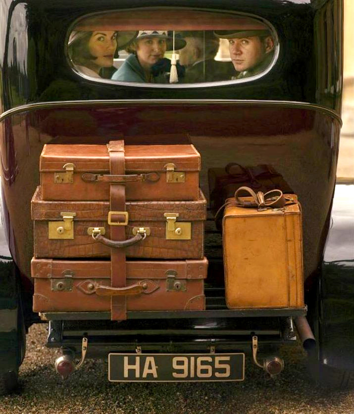Downton Abbey car packed with suitcases 