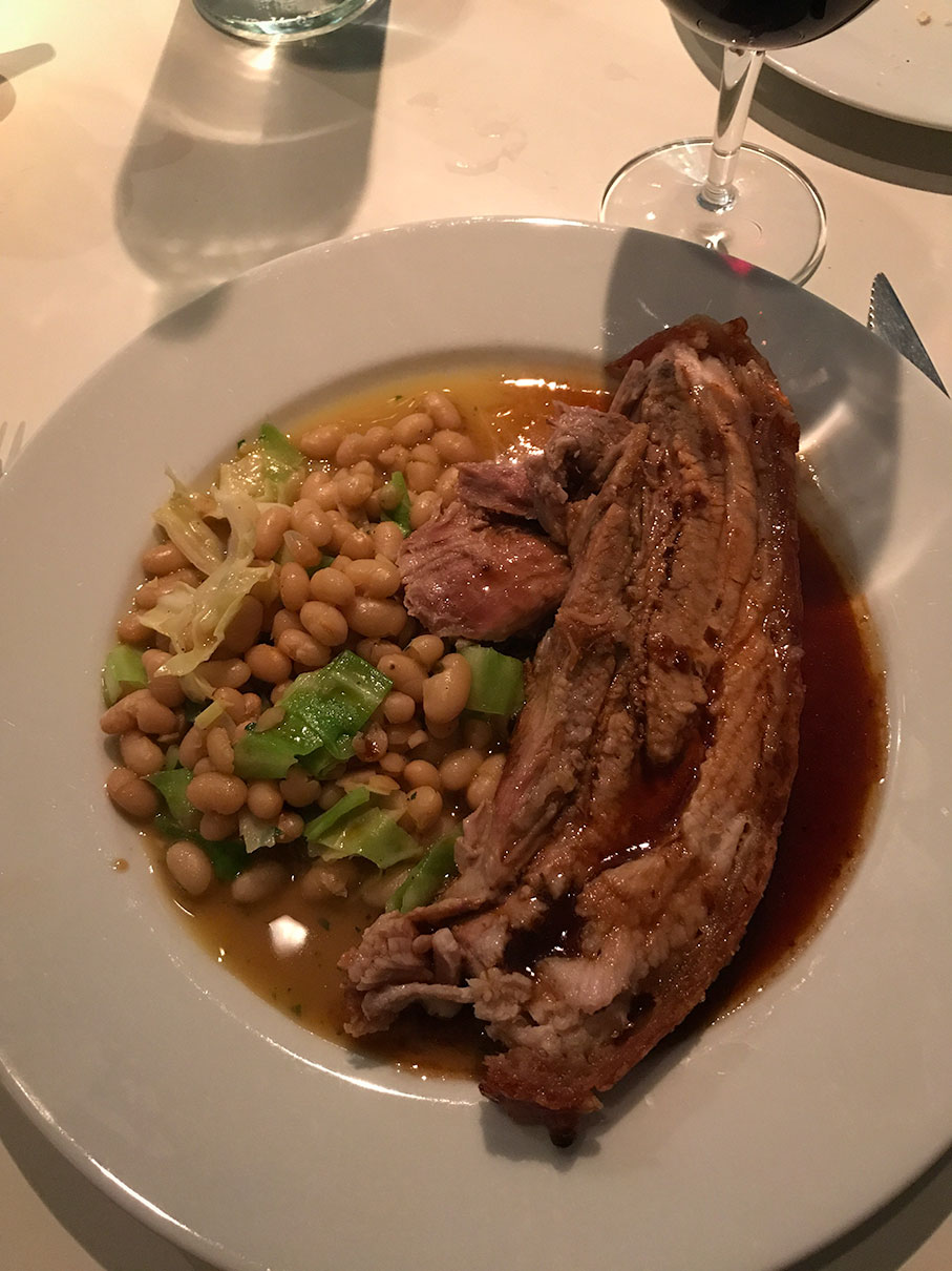 Pork belly with white beans and hispi at the Hereford Road restaurant in London