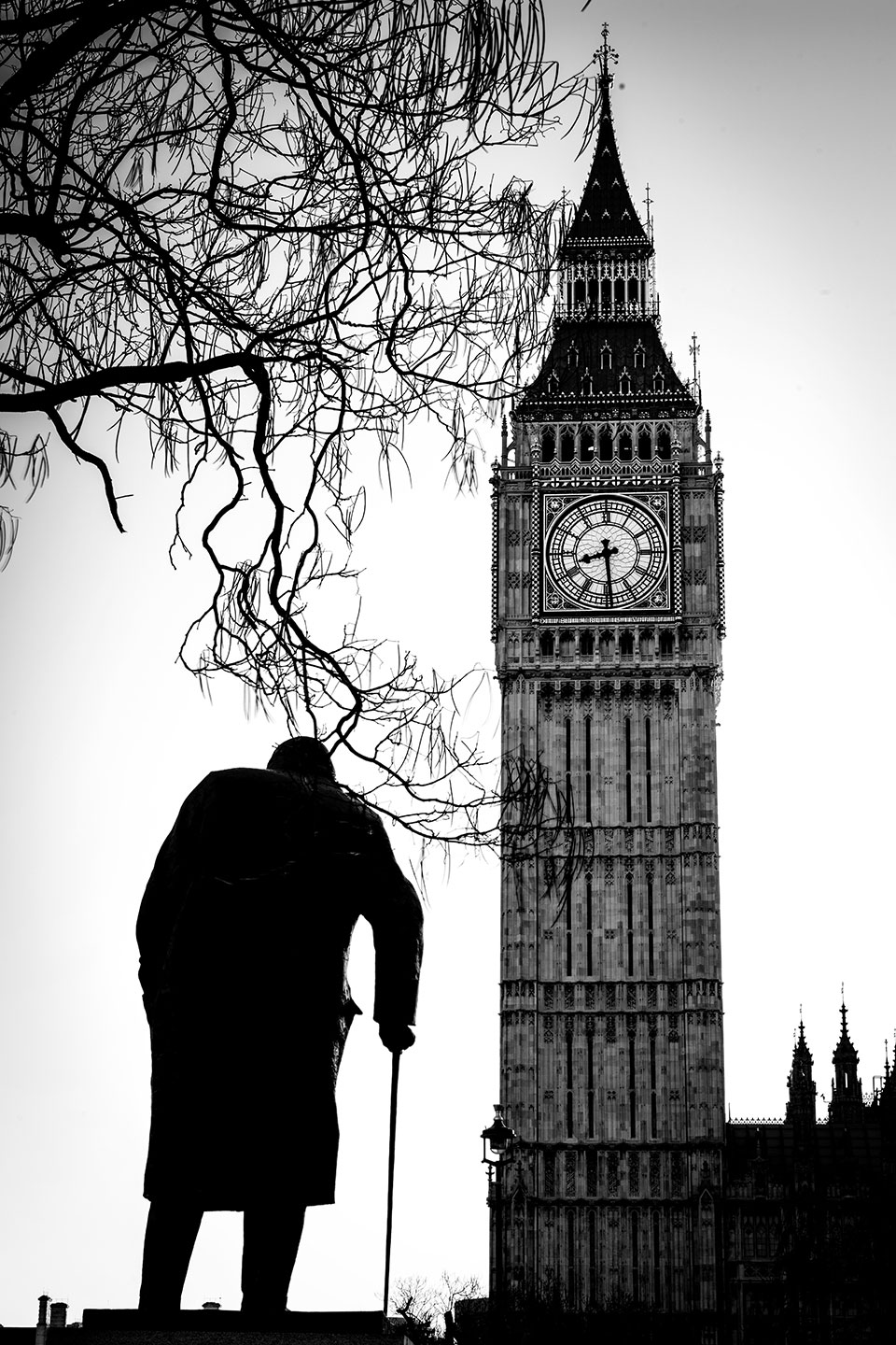 Statue of Winston Churchill facing the Houses of Parliament and Big Ben. 