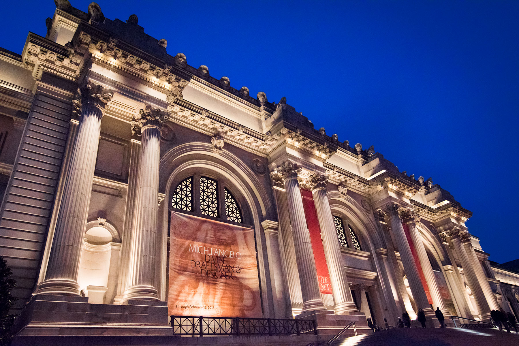 Metropolitan Museum facade at night during the Michelangelo exhibit