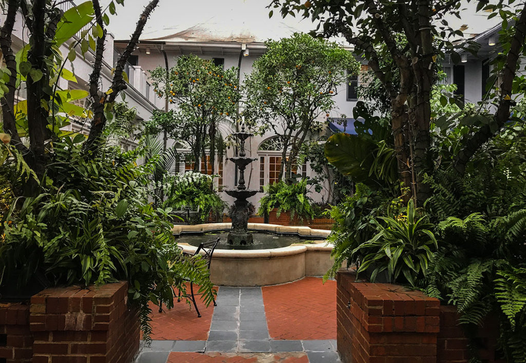 Courtyard of the Royal Sonesta Hotel, a luxury hotel in the French Quarter of New Orleans. Photograph, Ann Fisher.