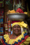 Woman with fruit on her head Cartagena Colombia