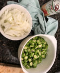 Okra, onion, and canned tomatoes, ready for cooking