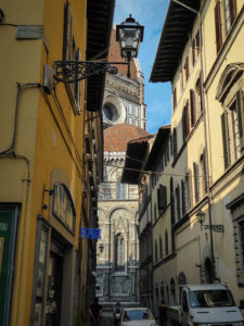 Seeing the Duomo down a street in Florence