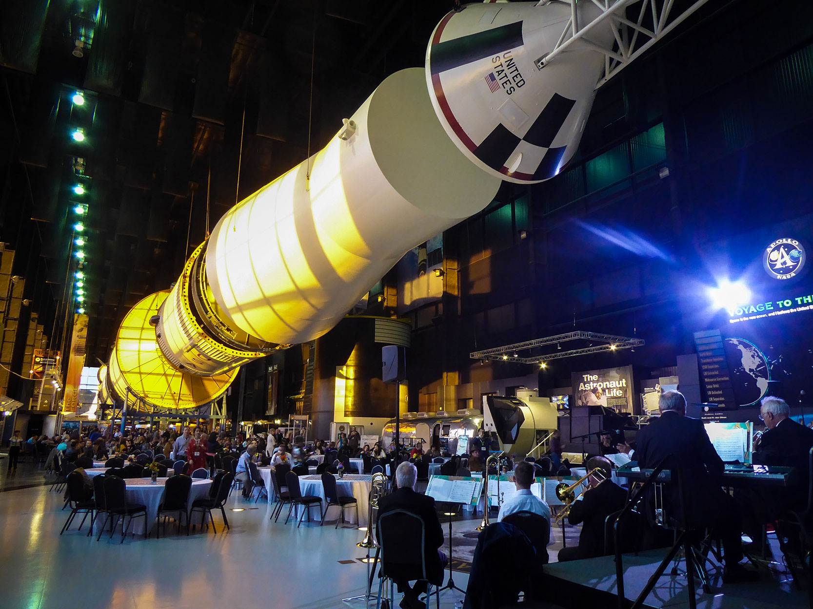 TBEX travel blogging conference -- partying under the Apollo rocket at the US Rocket Center in Huntsville, Alabama