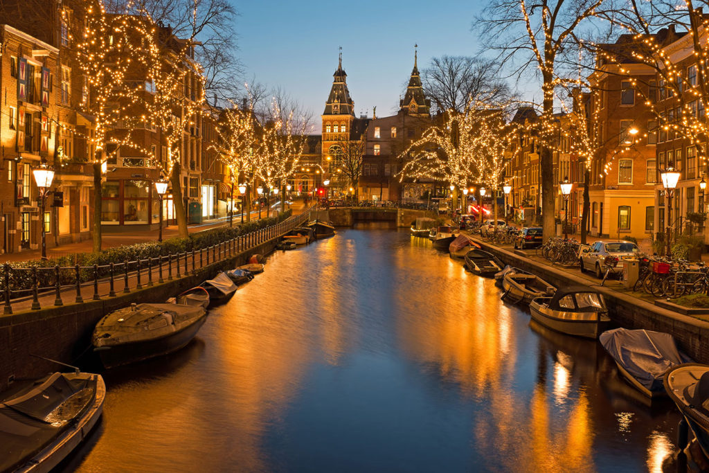 Christmas lights on canal in Amsterdam the Netherlands