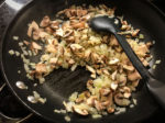 Cooking mushrooms and onions for muffin pan frittatas